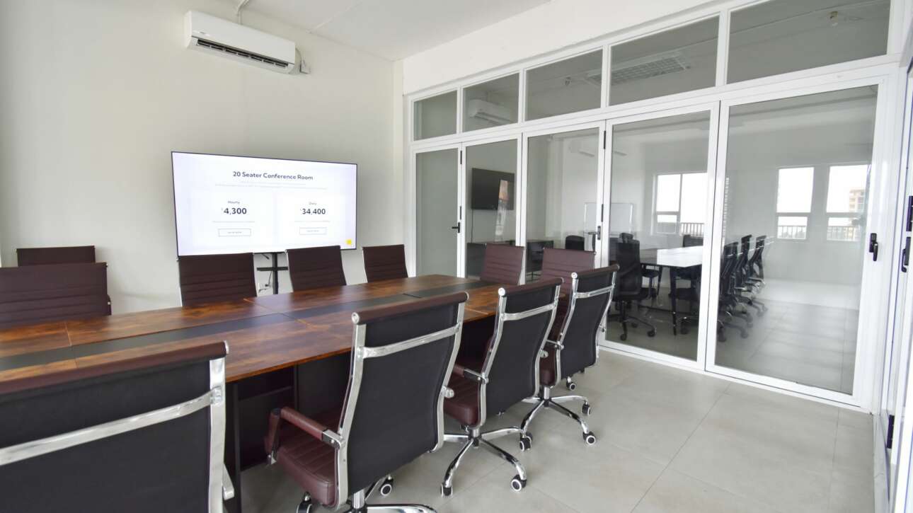 The conference room level utilizes stackable glass doors to configure the space as needed. Modular tables facilitate ease of use for any type of meeting or event