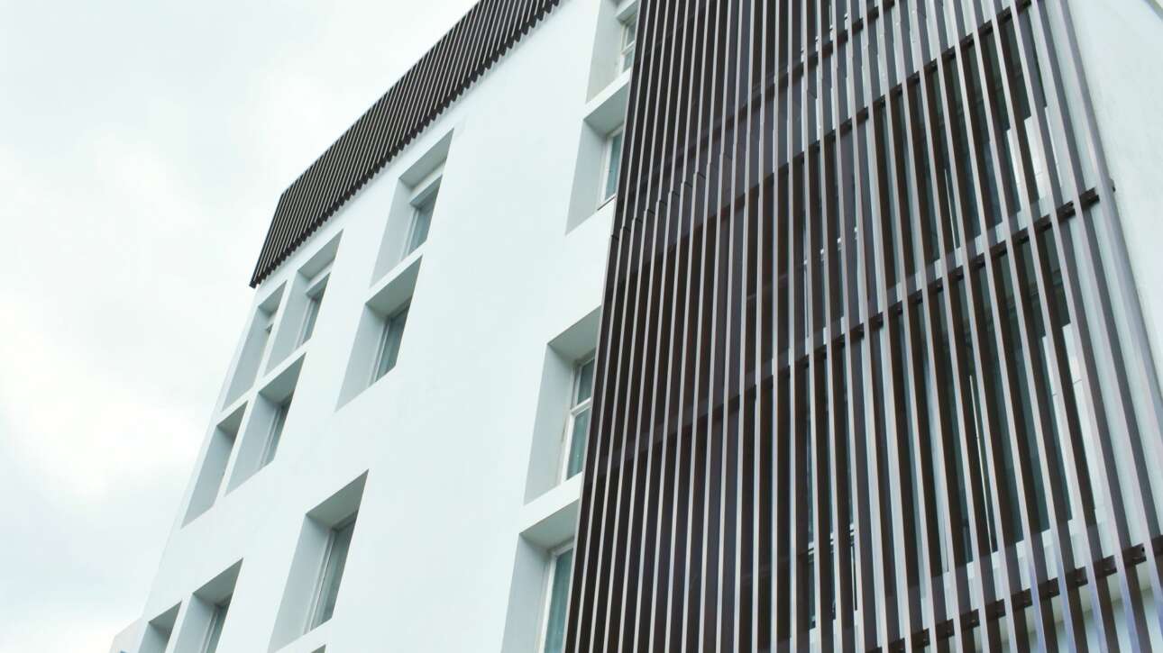The exterior was modernised by resurfacing the walls and redesigning the facade